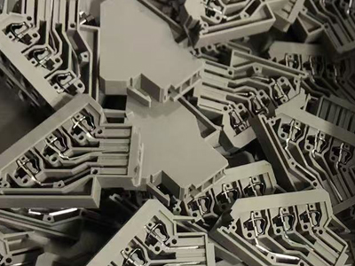 Secondary-wiring terminal blocks are being produced in the assemly line